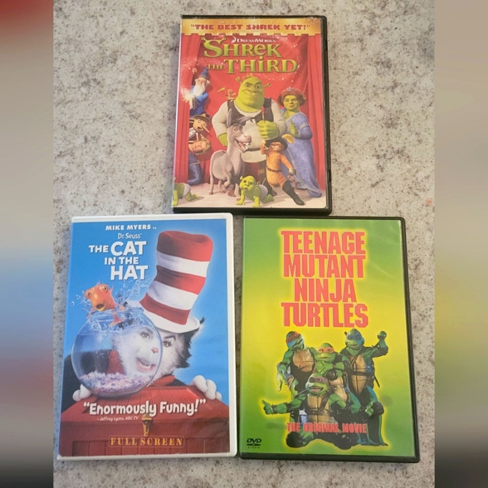 3 DVDs, Shrek, Cat in hat, and Ninja Turtles